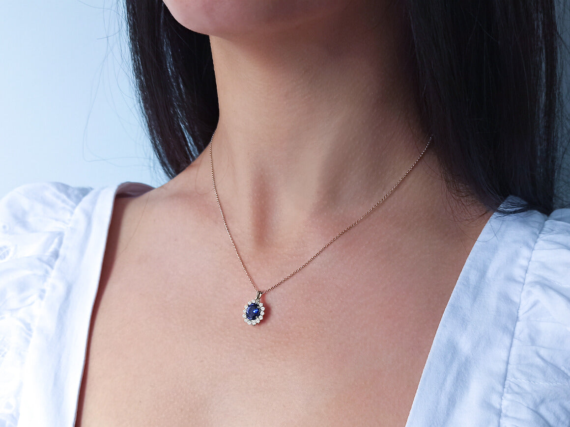 Diamond and oval sapphire necklace
