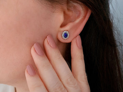 Diamond and oval sapphire jewelry set in 14 K white gold