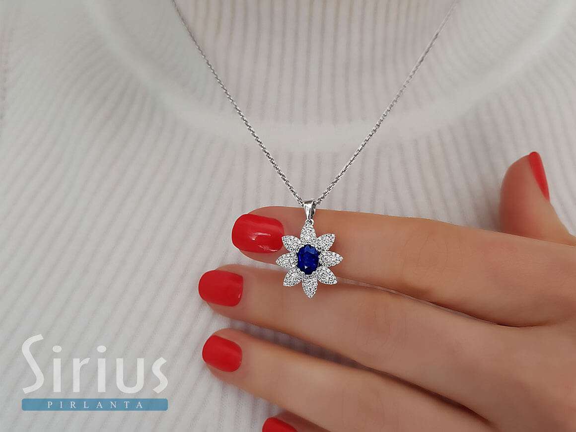 Diamond and oval sapphire necklace in 14 K white gold