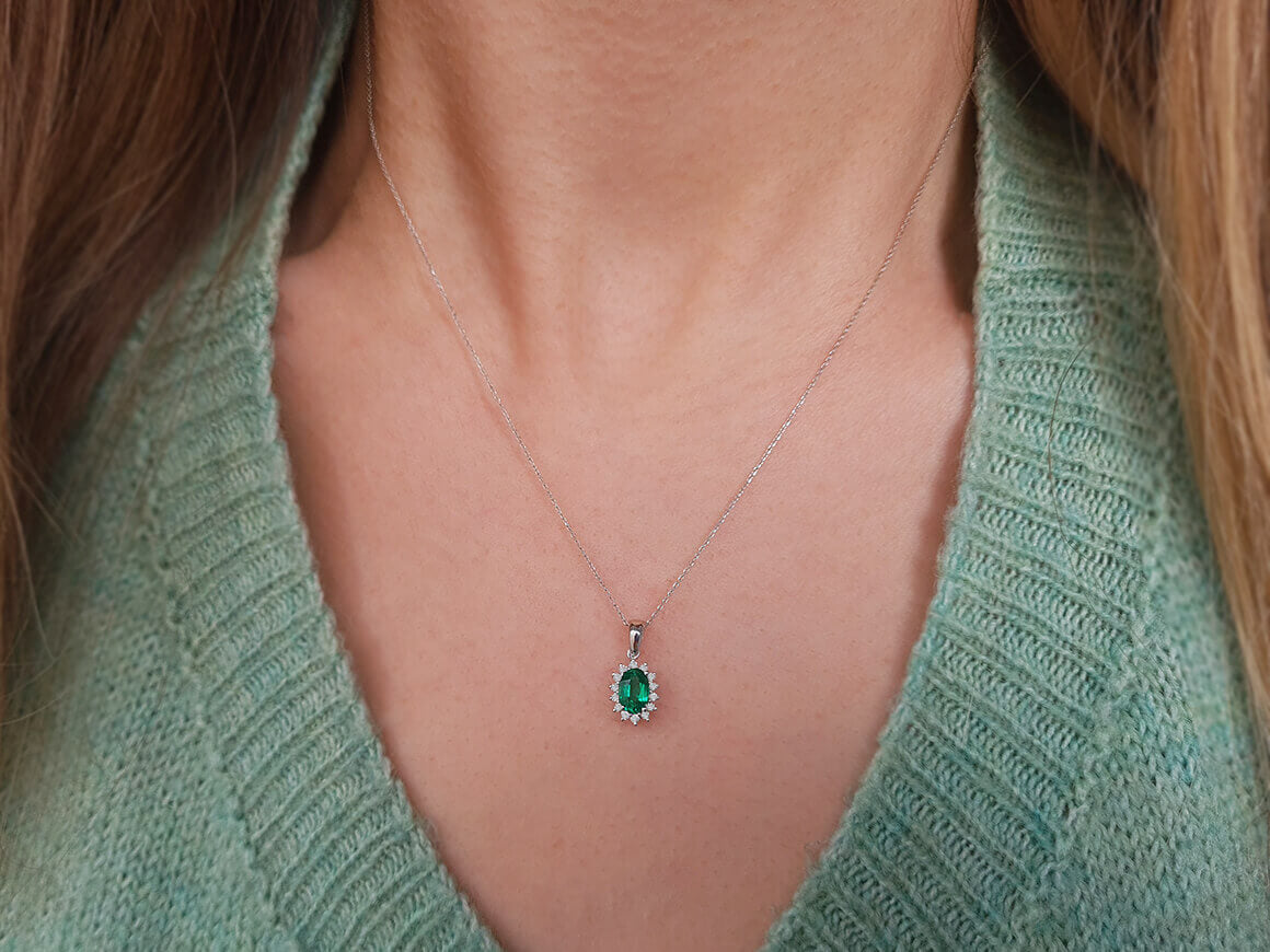 Diamond and oval emerald necklace