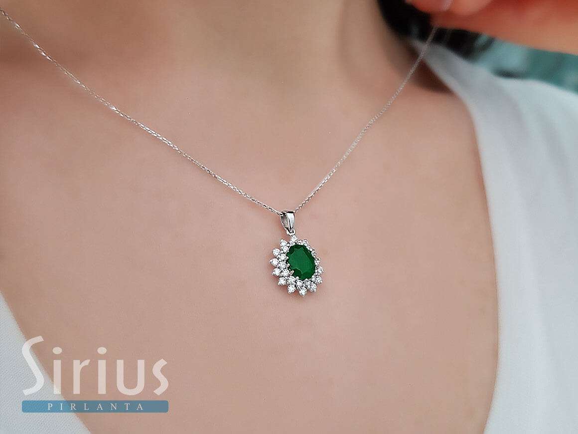 Diamond and oval emerald necklace