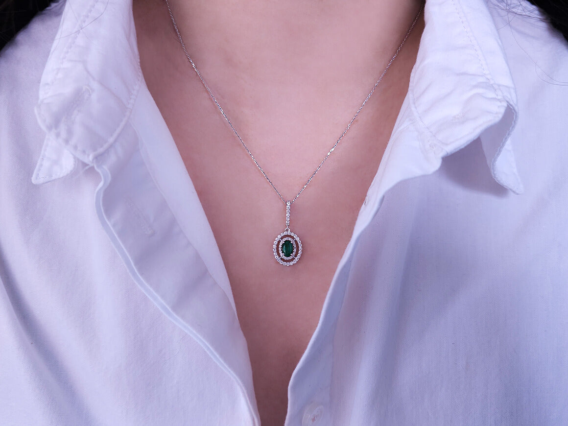 Diamond and oval emerald necklace