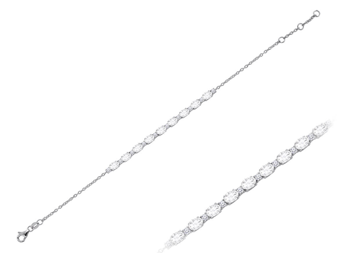 Diamond and oval white topaz bracelet in 14 carat white gold