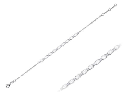 Diamond and oval white topaz bracelet in 14 carat white gold