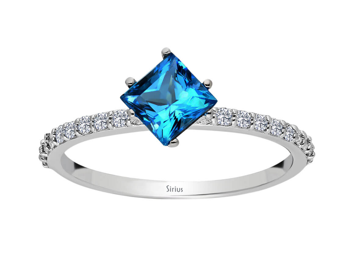 Diamond and Princess London Blue Topaz Ring