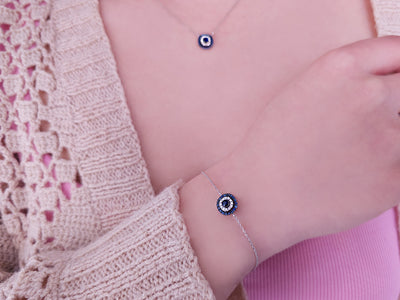 Diamond and sapphire icon bracelet in 14 K white gold