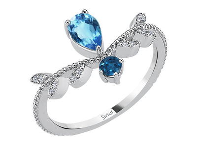 Diamond ring with topaz in white gold