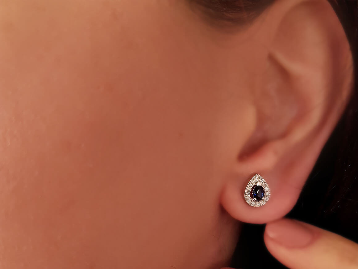 Diamond and drop sapphire stud earrings in 14-carat gold