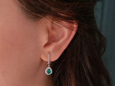 Diamond and drop emerald earrings in 14K white gold