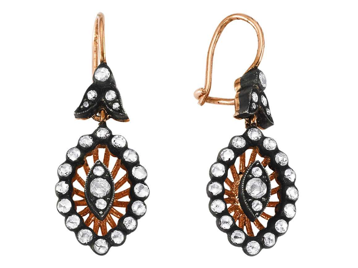 Diamond-studded eye earrings