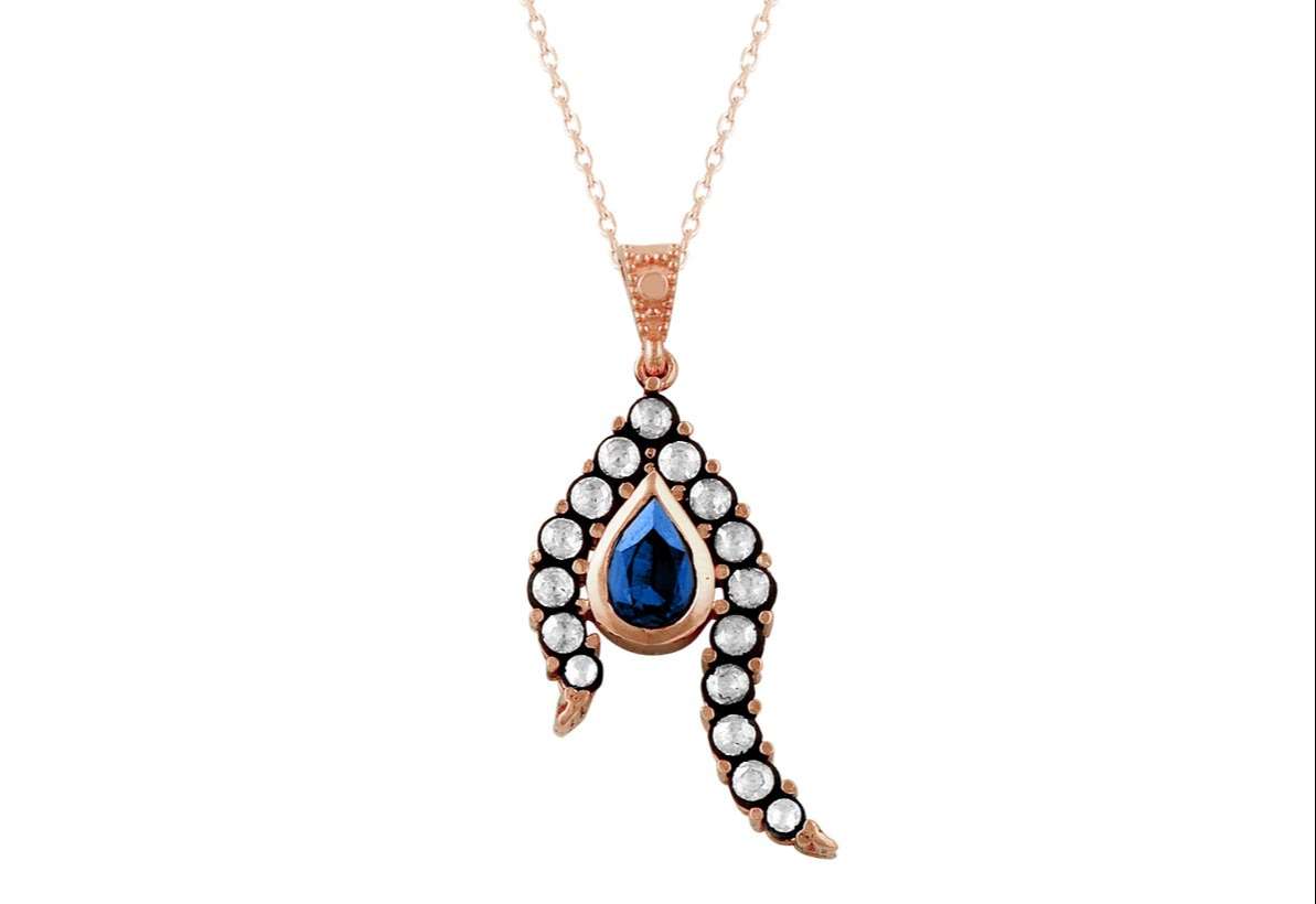 Necklace with diamonds and pear-shaped sapphires