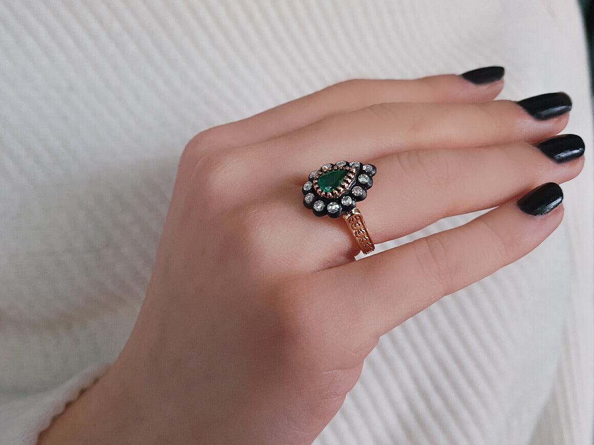 Diamond and pear emerald ring