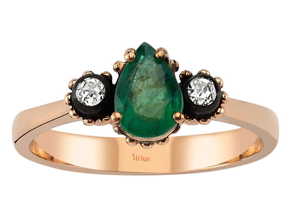 Ring with diamonds and pear-shaped emeralds