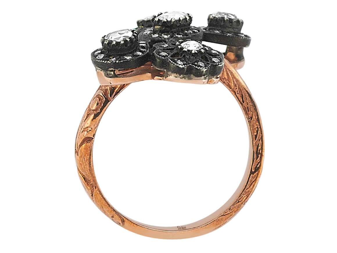 Diamond cut diamond ring in 8 carat red gold