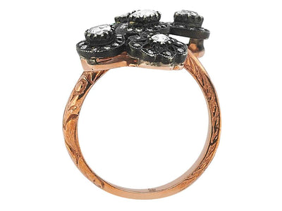 Diamond cut diamond ring in 8 carat red gold