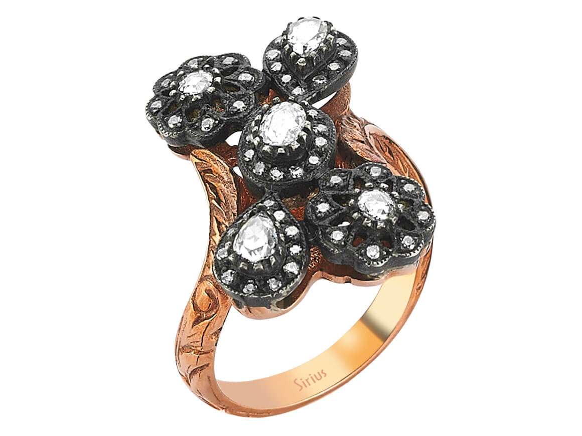 Diamond cut diamond ring in 8 carat red gold