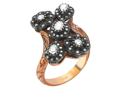 Diamond cut diamond ring in 8 carat red gold