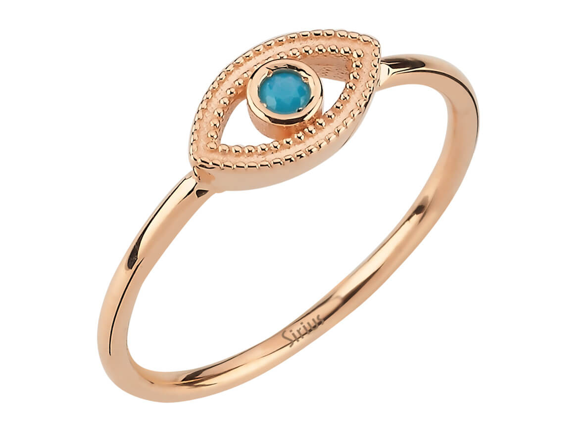 Ring with deep eyes and turquoise stone