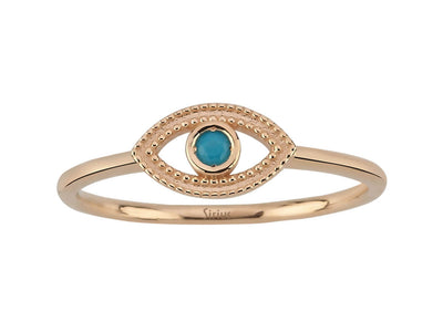 Ring with deep eyes and turquoise stone