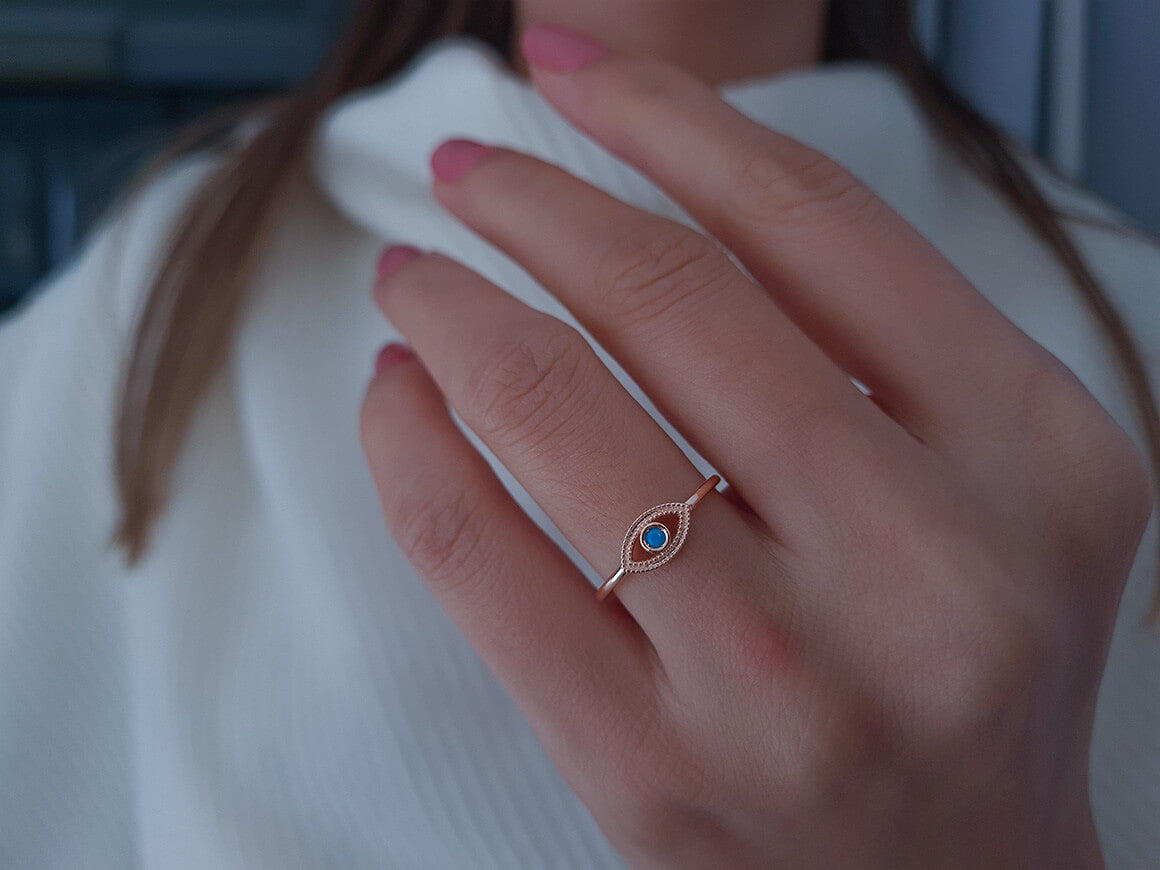 Ring with deep eyes and turquoise stone
