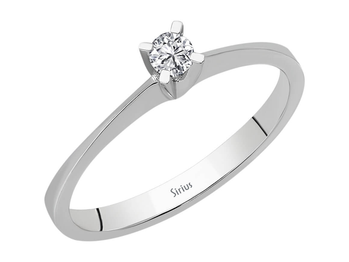 0.10 carat diamond solitaire ring in 8 K white gold