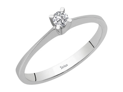 0.10 carat diamond solitaire ring in 8 K white gold