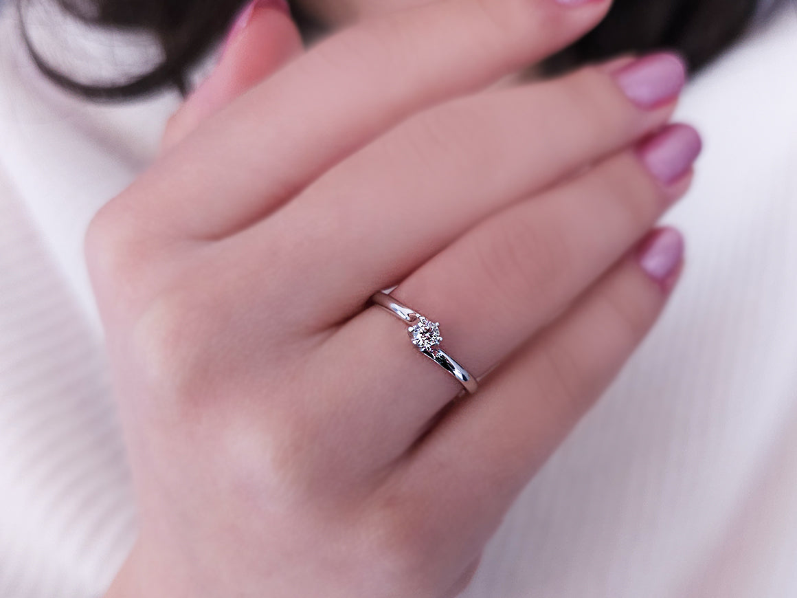 0.13 carat diamond solitaire ring in 18 carat white gold