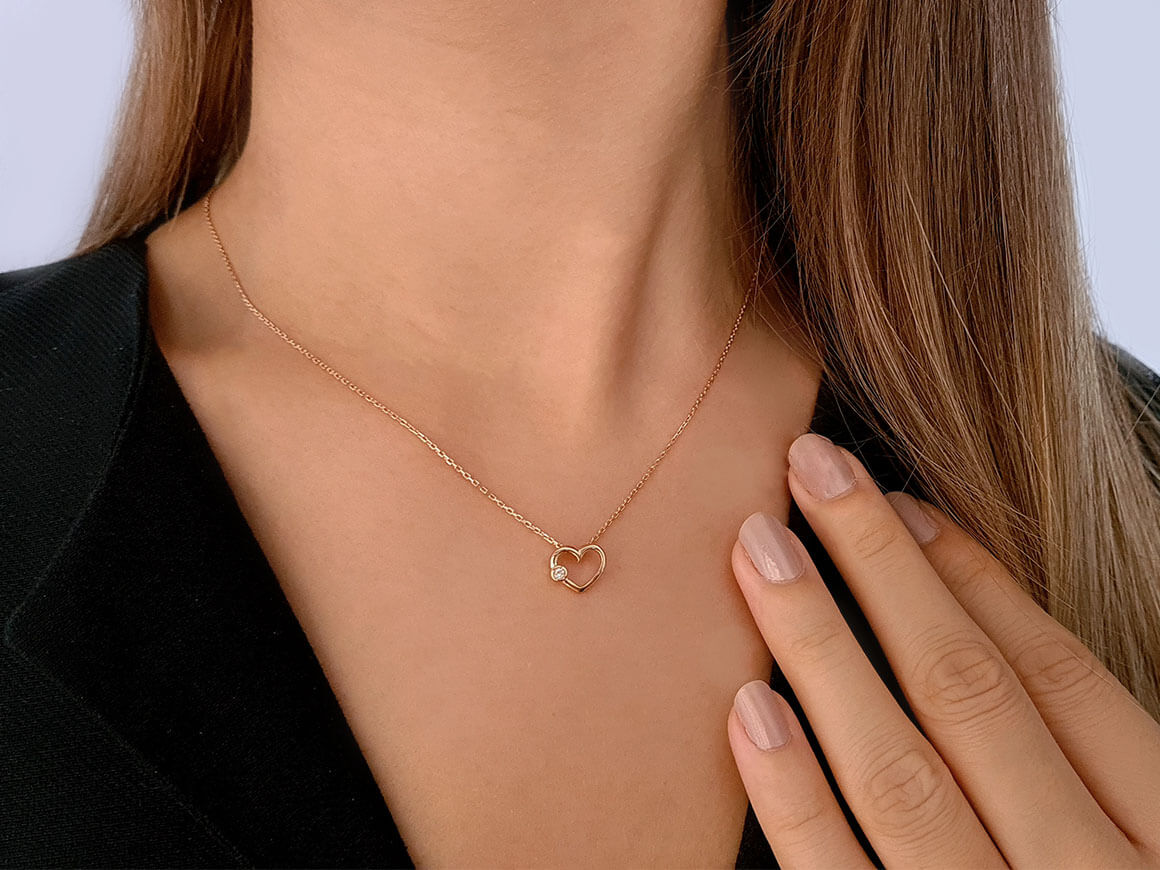 0,02 Karat Diamant Herz Collier in 333er 8 Karat Rotgold/Rosegold - handgefertigter Diamantschmuck aus Feingold | Sirius Diamant