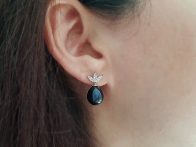 Black drop pearl earrings with diamonds in 14 K white gold