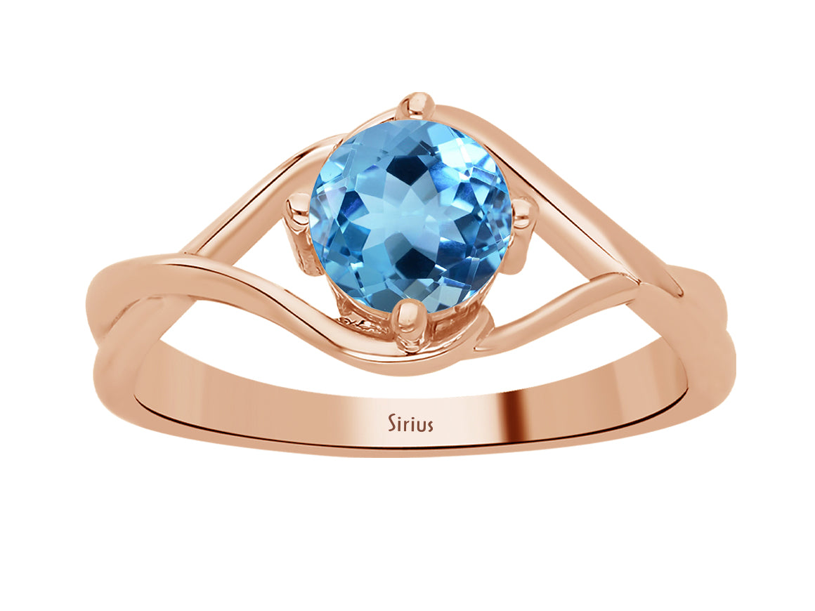 Moana Ring mit blauem Topas - handgefertigter Diamantschmuck aus Feingold | Sirius Diamant