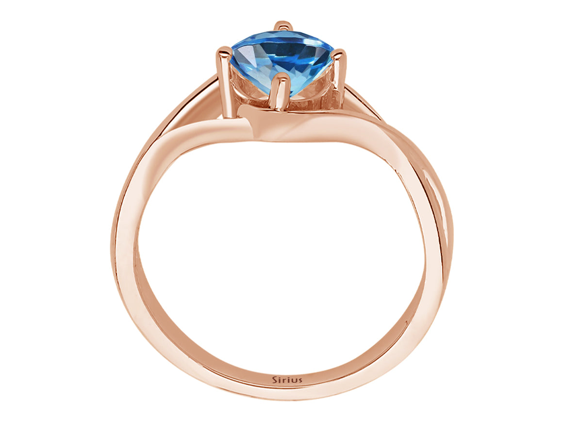 Moana Ring mit blauem Topas - handgefertigter Diamantschmuck aus Feingold | Sirius Diamant