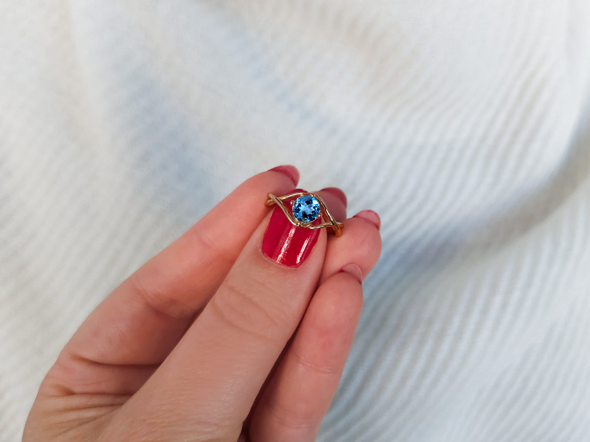 Moana ring with blue topaz