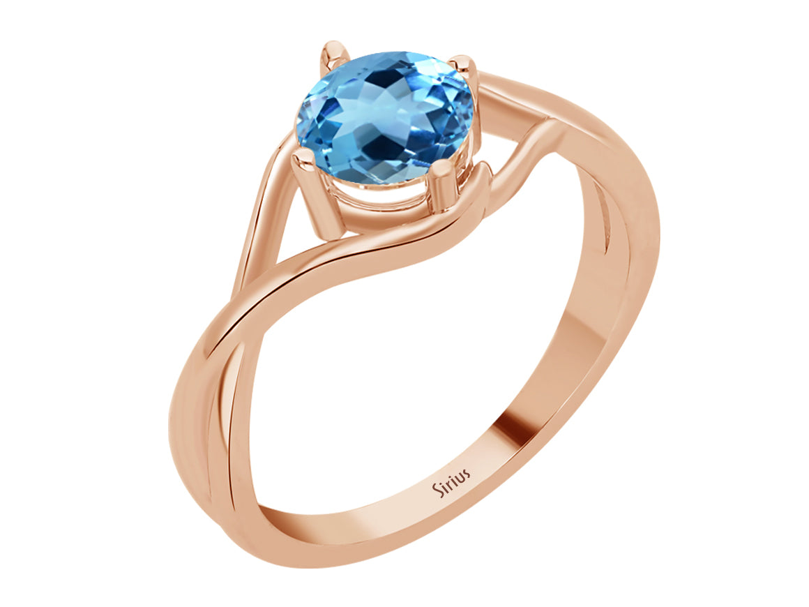 Moana Ring mit blauem Topas - handgefertigter Diamantschmuck aus Feingold | Sirius Diamant
