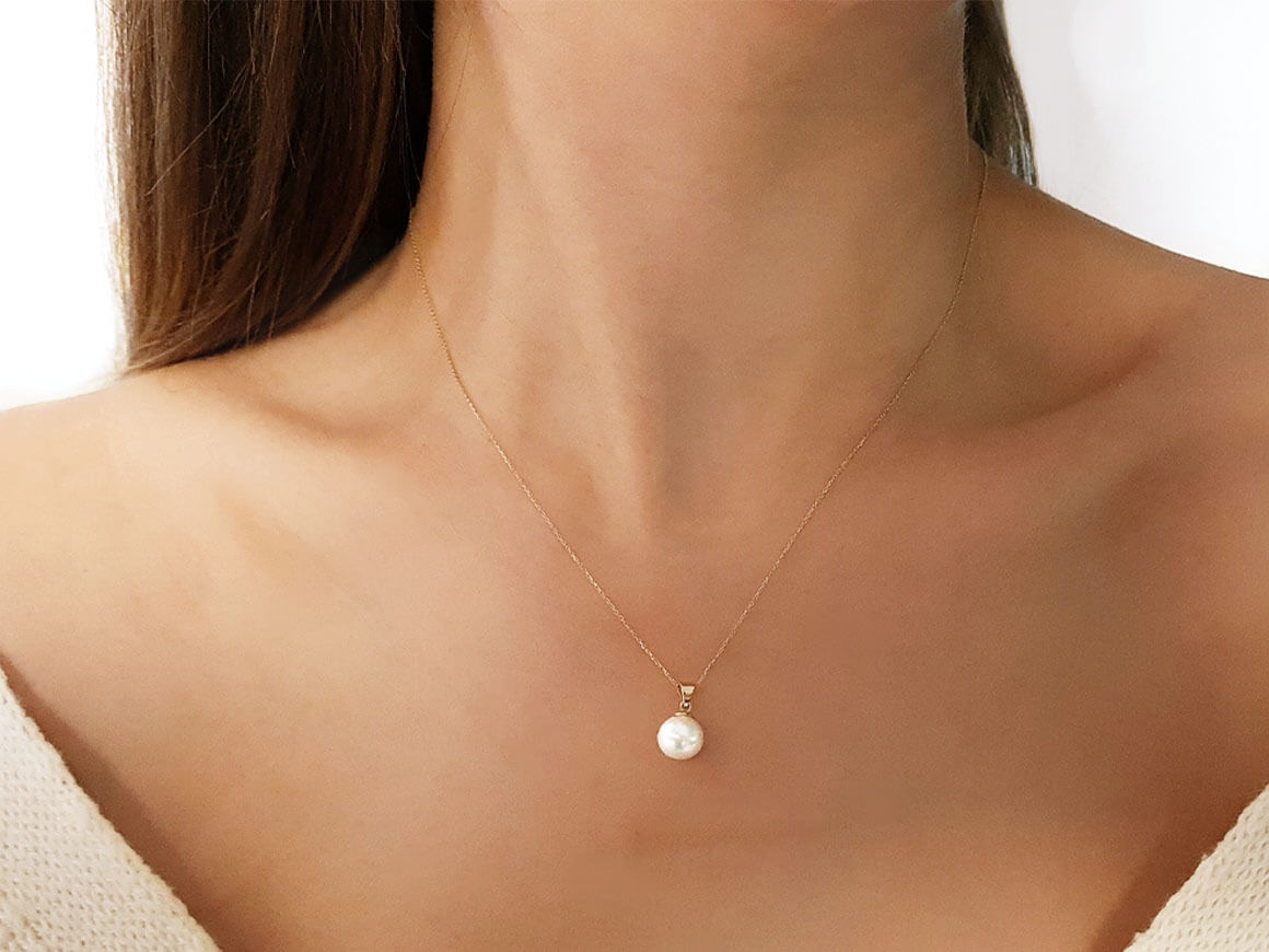 Natur Perle Collier in 14K Gelbgold - 7,5 mm - handgefertigter Diamantschmuck aus Feingold | Sirius Diamant
