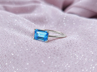 Ring with octagon-cut blue topaz