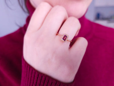 Octagon cut pink tourmaline ring in 14 carat red gold