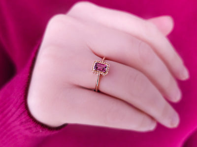 Octagon cut pink tourmaline ring in 14 carat red gold