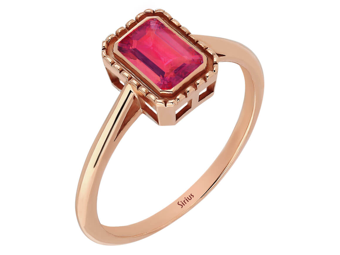 Octagon cut pink tourmaline ring in 14 carat red gold