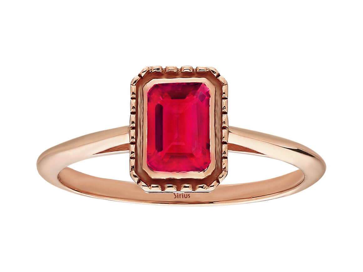 Octagon cut pink tourmaline ring in 14 carat red gold