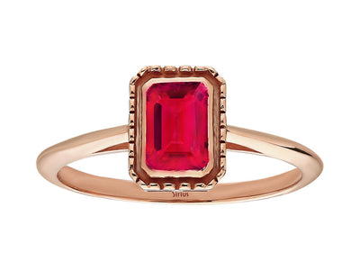 Octagon cut pink tourmaline ring in 14 carat red gold