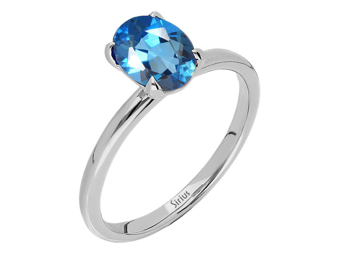 London Blauer Topas Solitär Ring - handgefertigter Diamantschmuck aus Feingold | Sirius Diamant