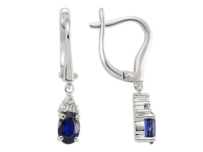 Diamond and oval sapphire earrings in 8 carat white gold