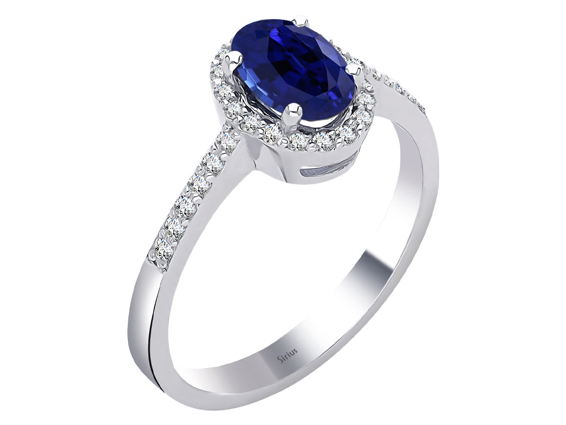 Diamond and oval sapphire ring in 14K white gold