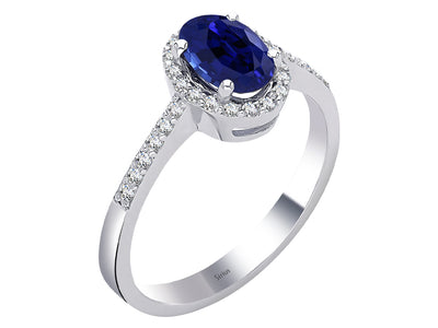 Diamond and oval sapphire ring in 14K white gold