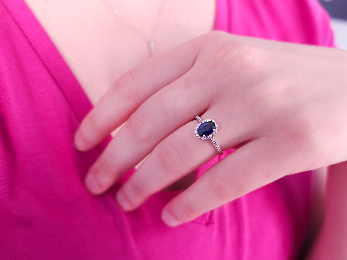 Diamond and oval sapphire ring in 14K white gold