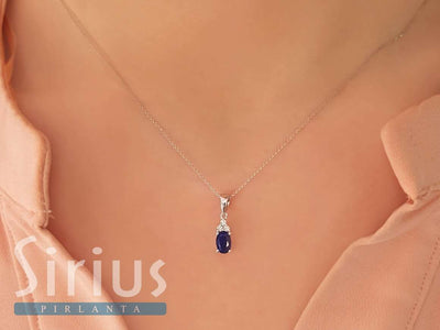 Diamond and oval sapphire necklace in 8 K