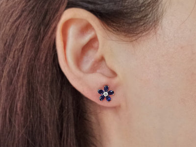 Diamond and oval sapphire violet stud earrings in 333 8 carat white gold