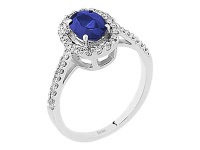 Diamond and oval sapphire ring in 14K white gold