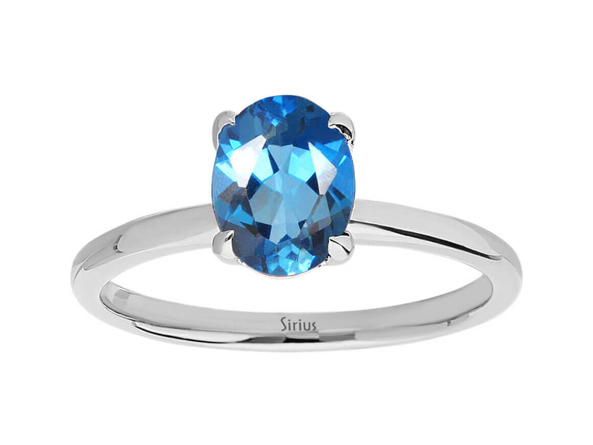 London Blauer Topas Solitär Ring - handgefertigter Diamantschmuck aus Feingold | Sirius Diamant