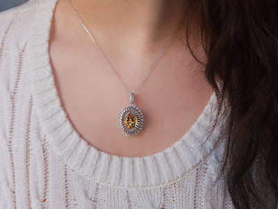 Diamond and oval citrine necklace in 14-carat white gold